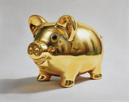 未来への投資:光沢のある金色の豚の貯金箱 未来への投資:光沢のある金色の豚の貯金箱の写真
