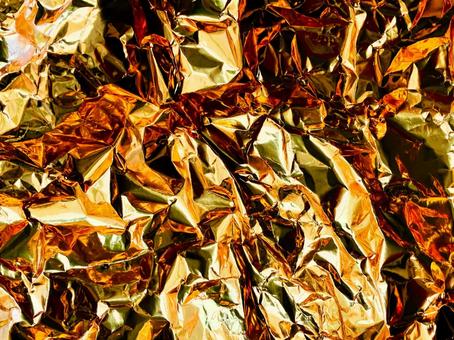 金色の紙くしゃくしゃ(粗め) 金色の紙くしゃくしゃ(粗め)の写真
