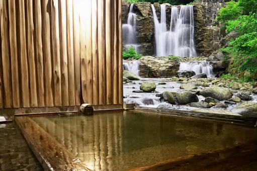 Open-air bath with a view of the waterfall Open-air bath with a view of the waterfall