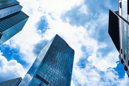 高層ビルを見上げるオフィス街の風景 都市風景,高層ビル,ビルの写真素材