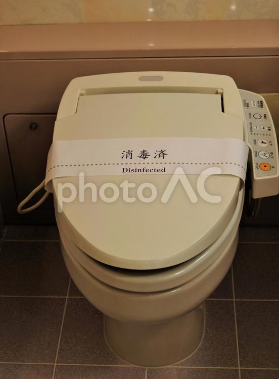 消毒済みのラベルが張られたウォシュレット 消毒済み,消毒,感染防止の写真素材