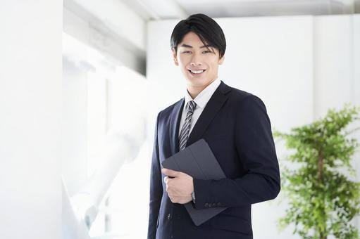 Japanese male businessman looking at the camera with a smile, wong lanang, pengusaha, senyawa, JPG