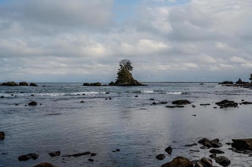 雨晴海岸 雨晴海岸 雨晴海岸,女岩,海の写真素材
