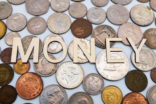 コインの上に置かれた「MONEY」の文字 マネー,お金,通貨の写真素材