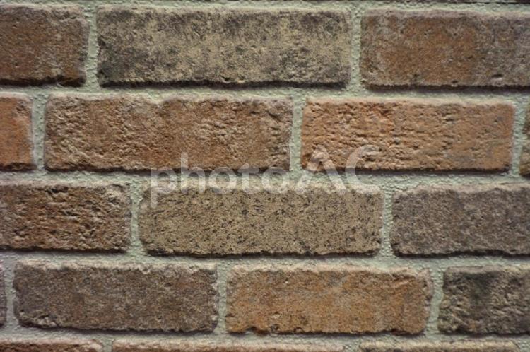 暖色系のレンガの壁 背景,背景素材,壁紙の写真素材