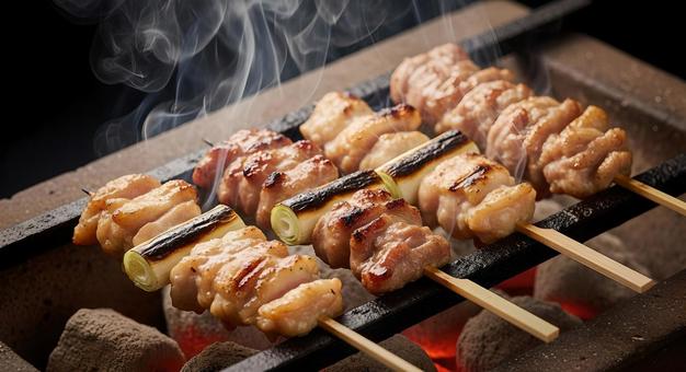 備長炭で焼き鳥を焼いている写真 備長炭で焼き鳥を焼いている写真の写真