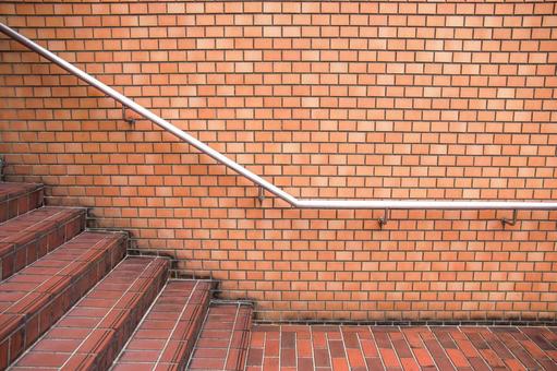 レンガの壁と階段と手すり レンガ,壁,煉瓦の写真素材