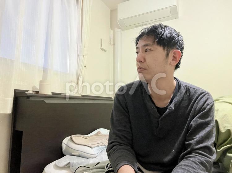 寝起きが辛い男性　4 疲れ,疲労,寝起きの写真素材