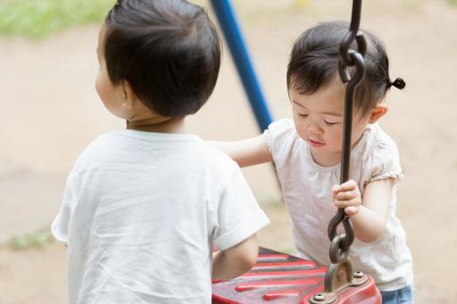 Fighting over the swing, JPG