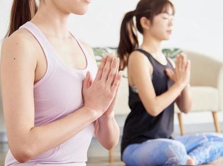 Asian woman meditating with yoga Asian woman meditating with yoga