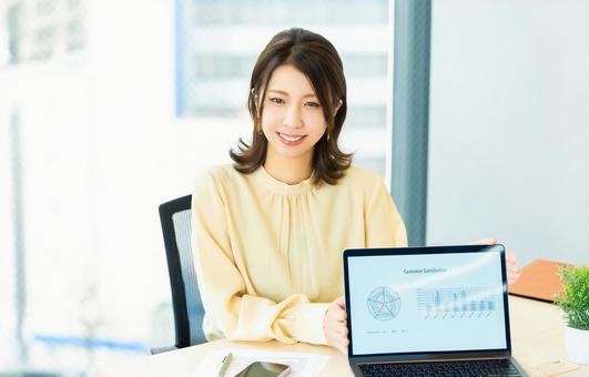 Smiling woman/businesswoman having a conversation, JPG