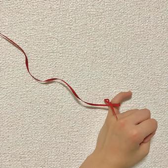 運命の赤い糸 運命の赤い糸 赤い糸,小指,リボンの写真素材