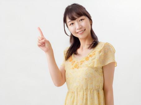 Young smiling woman portrait pointing, JPG Young smiling woman portrait pointing, depilation, female, anti-aging, JPG