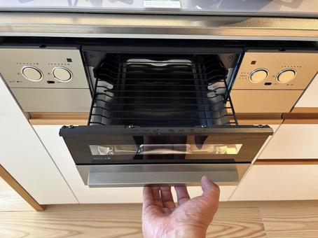 グリルを開ける グリル,魚焼き,開けるの写真素材