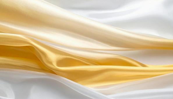 金色と白色の高級感のある生地の写真