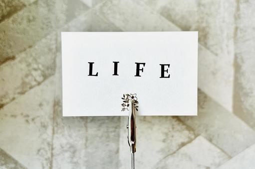 LIFEの文字とメモスタンド LIFEの文字とメモスタンド ライフ,人生,マイホームの写真素材