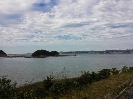 曇り空と穏やかな海 曇り空と穏やかな海の写真