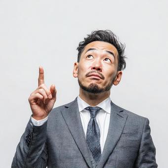 問題を解決する閃きを得たビジネスマンの写真