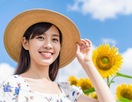 ひまわり・麦わら帽子の彼女 ひまわり・麦わら帽子の彼女の写真