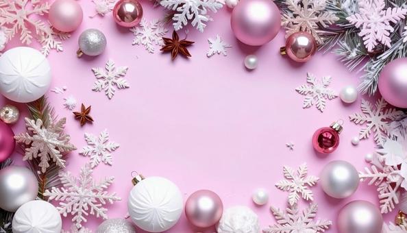 クリスマス　フレーム　ピンク色の背景の写真