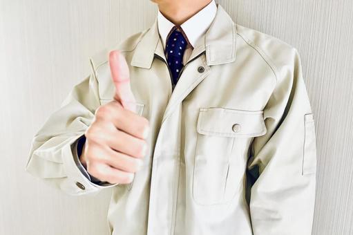 親指を立てる作業着姿の男性 作業員,エンジニア,男性の写真素材