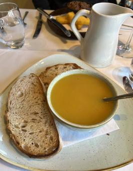 かぼちゃのスープとパン かぼちゃのスープとパン かぼちゃ,スープ,パンの写真素材