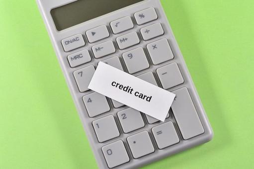 電卓とcredit card 電卓とcredit card creditcard,クレジットカード,無人の写真素材
