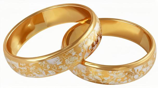 繊細な装飾が施された金色の結婚指輪 繊細な装飾が施された金色の結婚指輪の写真