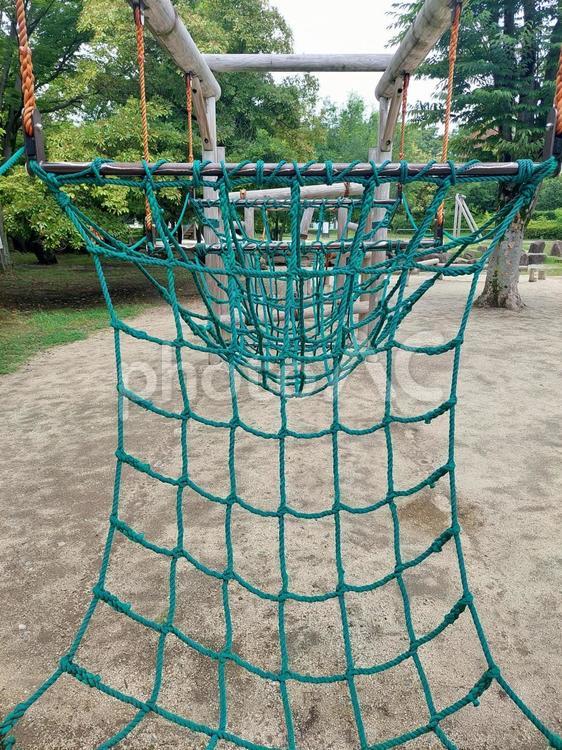 公園の木製フィールドアスレチック遊具 アスレチック遊具,遊具,複合遊具の写真素材