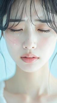 涙を流す女性 涙を流す女性の写真
