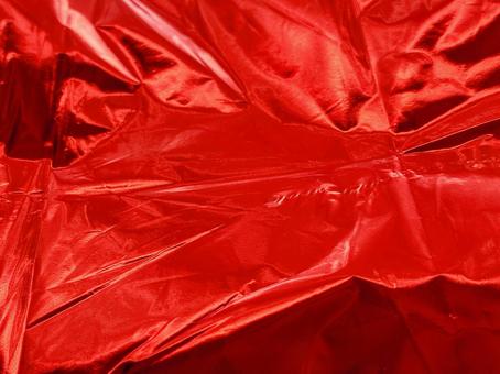 赤いホイルのシワ テクスチャ,シワ,しわくちゃの写真素材