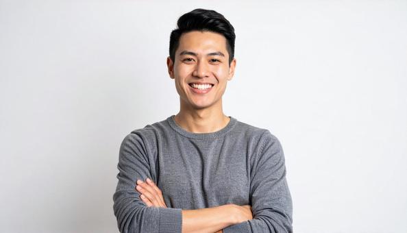 セーターを着た笑顔の男性のポートレート セーターを着た笑顔の男性のポートレートの写真
