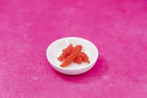 ピンク背景におせちで使われるちょろぎ ちょろぎ,酢漬け,漬物の写真素材