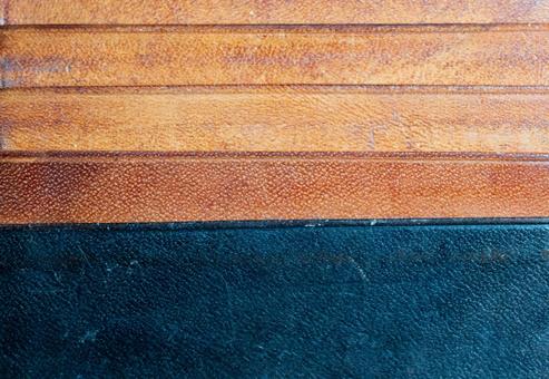 茶色と黒の革素材のクローズアップ 革,素材,背景の写真素材