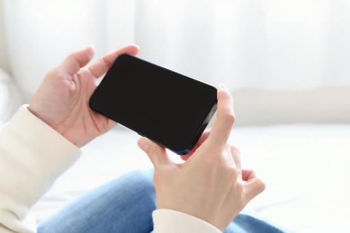スマホの画面 動画視聴 スマホの画面 動画視聴 スマホ,画面,動画の写真素材