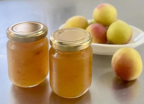 Homemade ripe plum jam on a white plate, JPG Homemade ripe plum jam on a white plate, JPG