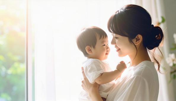 見つめ合う母親と赤ちゃん 見つめ合う母親と赤ちゃんの写真