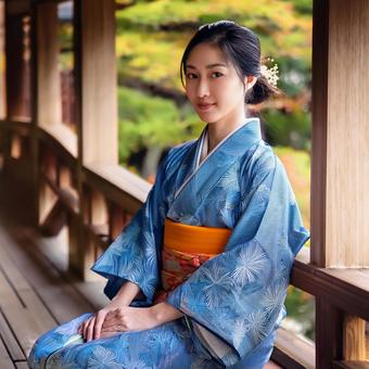 縁側でくつろぐ着物姿の女性_2 縁側でくつろぐ着物姿の女性_2の写真