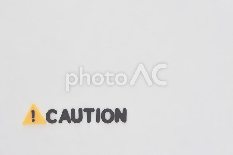 警告マークとcautionの文字 caution,警告マーク,警告の写真素材