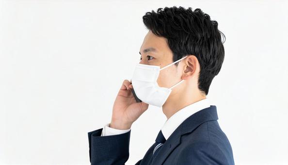 マスクをつける人 マスクをつける人の写真