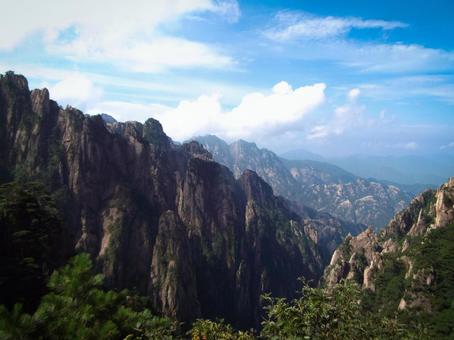 Spectacular views of steep rocky mountains and wide mountain ranges, JPG