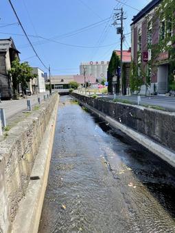 夏の小樽 運河の流れとレトロな街並み 北海道,小樽,運河の写真素材