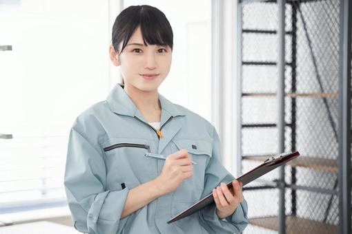 Japanese female worker inspecting housing equipment, JPG Japanese female worker inspecting housing equipment, 女子, 工人, 电气工人, JPG