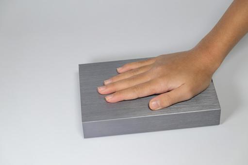 灰色に加工された板に触れる手 板,手,灰色の写真素材