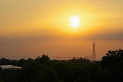 鉄塔と夕日 夕日,夕方,夕景の写真素材