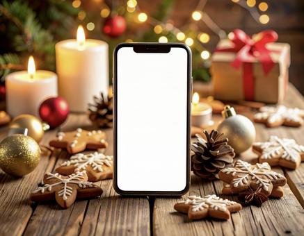 スマートフォンとクリスマス背景 スマートフォンとクリスマス背景の写真
