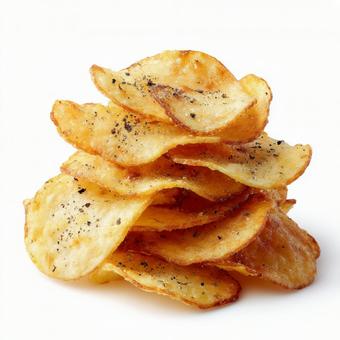 白い背景に映える、黄金色のポテトチップス 白い背景に映える、黄金色のポテトチップスの写真