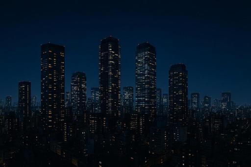 高層ビルが輝く夜の都市風景 高層ビルが輝く夜の都市風景の写真