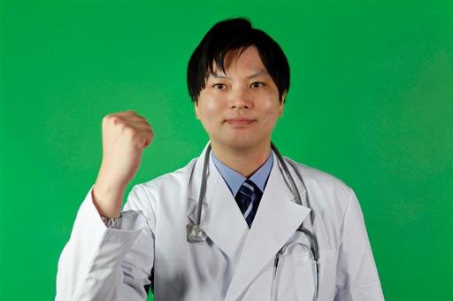 元気な男性医師のガッツポーズ 元気な男性医師のガッツポーズ 医師,男性,白衣の写真素材