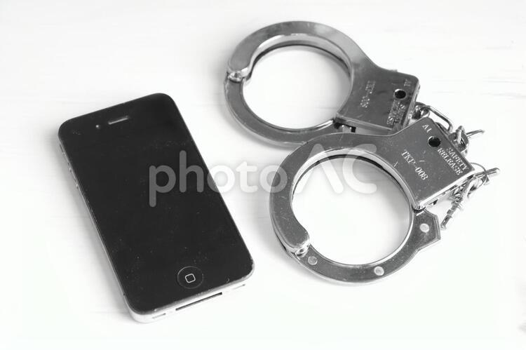 中傷  闇バイト　逮捕 闇バイト,高額バイト,誹謗の写真素材
